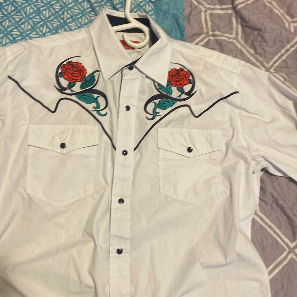 It’s a white party shirt and it’s size L